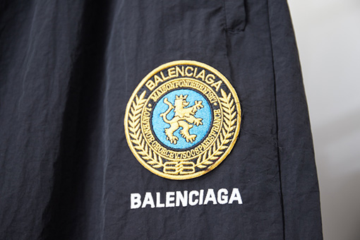 バレンシアガ BALENCIAGA 59 イエローレーベルマンチェスターユナイテッドロゴトラックパンツ