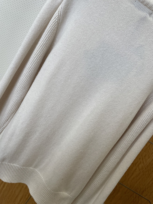 プラダ エナメルのトライアングルロゴパッチワークポケットニットセーター