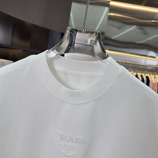 プラダ PRADAトライアングルロゴハンドカット中空の刺繍シリーズ半袖Tシャツ
