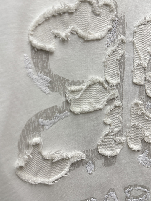 バレンシアガ BALENCIAGA ダイレクトプリントのタッセルアップリケ刺繍入り半袖Tシャツ