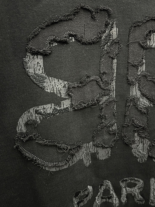 バレンシアガ BALENCIAGA ダイレクトプリントのタッセルアップリケ刺繍入り半袖Tシャツ