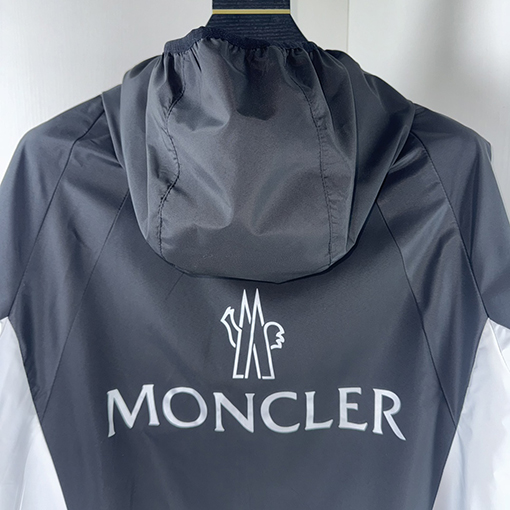 モンクレール MONCLER 黒と白のカラーブロックトレンチコートフード付きジャケット