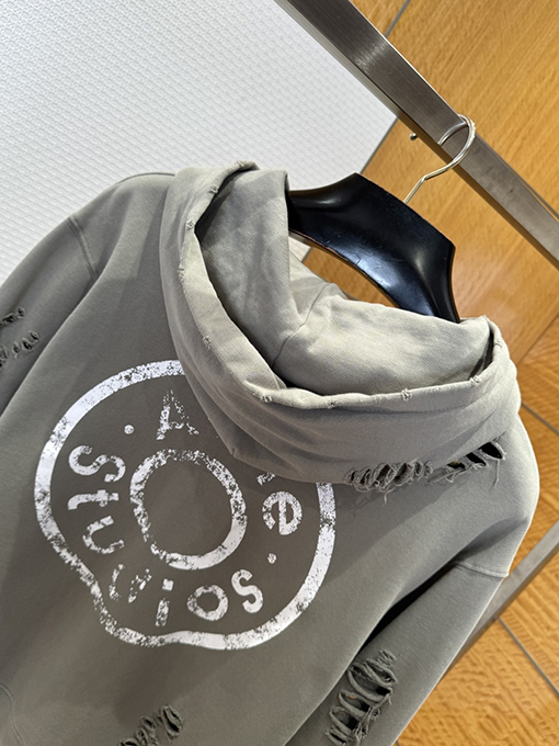 アクネストゥディオズブランドスーパーコピー Acne Studios ダメージプリントの破れたフード付きジップアップスウェットジャケット