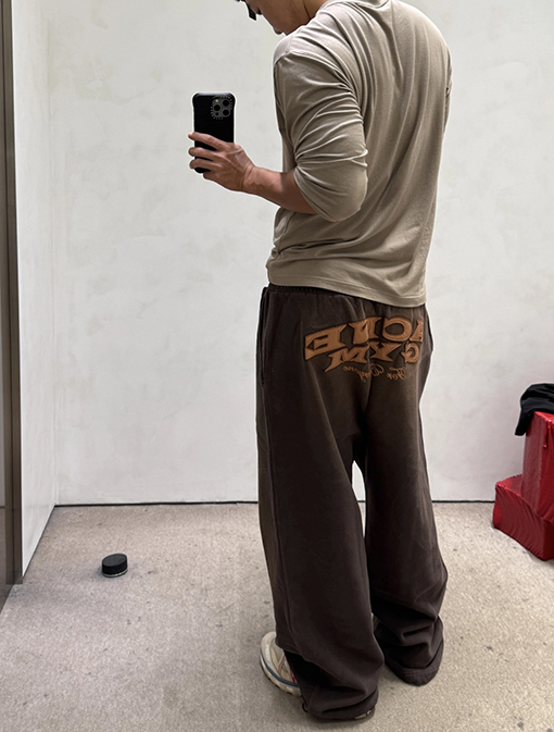 アクネストゥディオズ Acne Studios レザーアップリケ刺繍りダブルウエストバンドスウェットパンツ