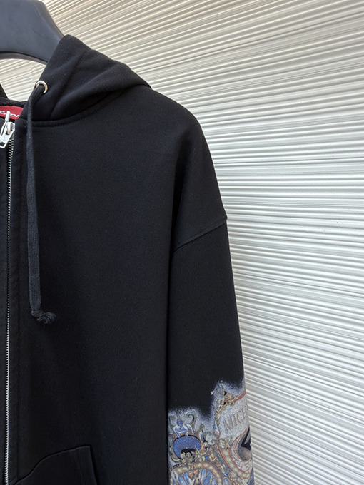 シュプリームスーパーコピー 袖に目のプリント入りコラボレーションデザインのフード付きジップアップスウェットシャツ