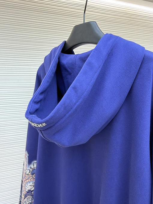 シュプリームスーパーコピー 袖に目のプリント入りコラボレーションデザインのフード付きジップアップスウェットシャツ