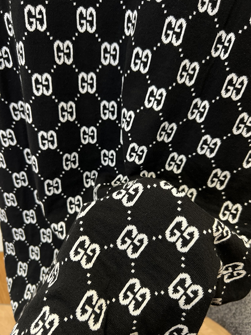 グッチ 全面ジャカードニットの半袖ポロシャツ