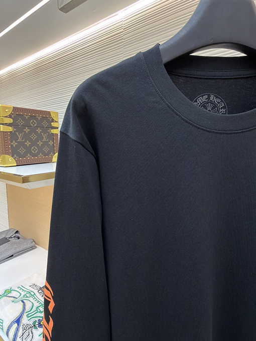 クロムハーツスーパーコピー スタイリッシュなオレンジ色のサンスクリット語ロゴ入り長袖シャツ