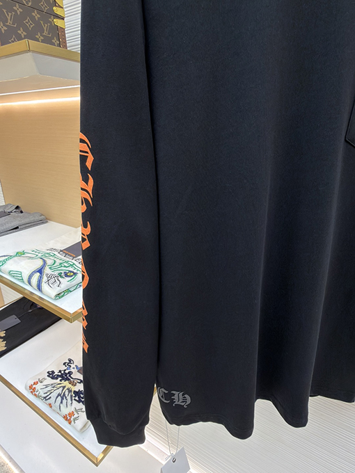 クロムハーツスーパーコピー スタイリッシュなオレンジ色のサンスクリット語ロゴ入り長袖シャツ