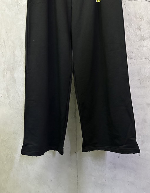 バレンシアガコピー Balenciaga 黄色のテープロゴ入りカジュアルパンツ