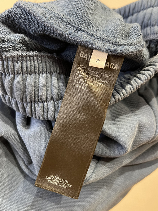 バレンシアガ サイドストライプ柄のワイドレッグカジュアルパンツ