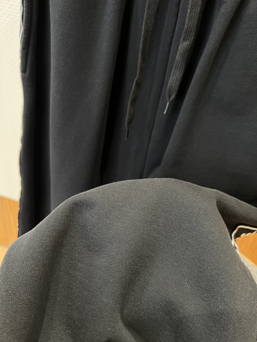 バレンシアガ サイドストライプ柄のワイドレッグカジュアルパンツ