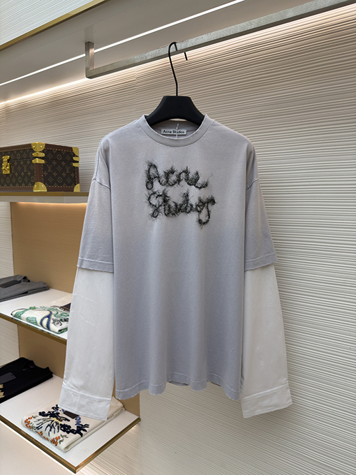 アクネストゥディオズ Acne Studios レトロスタイルのレイヤード風ツーピースロゴ入り長袖シャツ