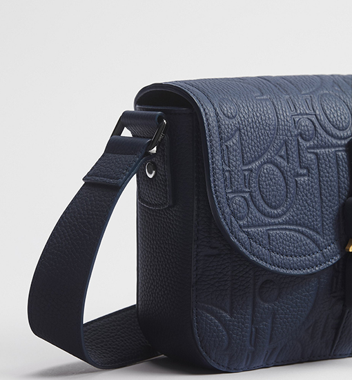 ディオール サドル型のフリップトップ式メッセンジャーバッグ