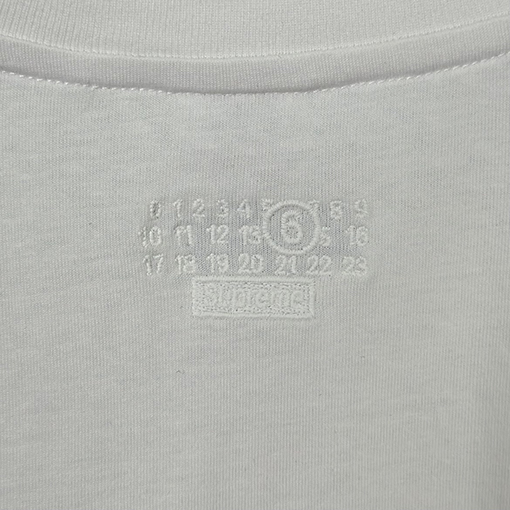 シュプリーム X マルタンマルジェラ MONEY S/S TOP コラボレーションによるゴールドフェザープリント半袖Tシャツ