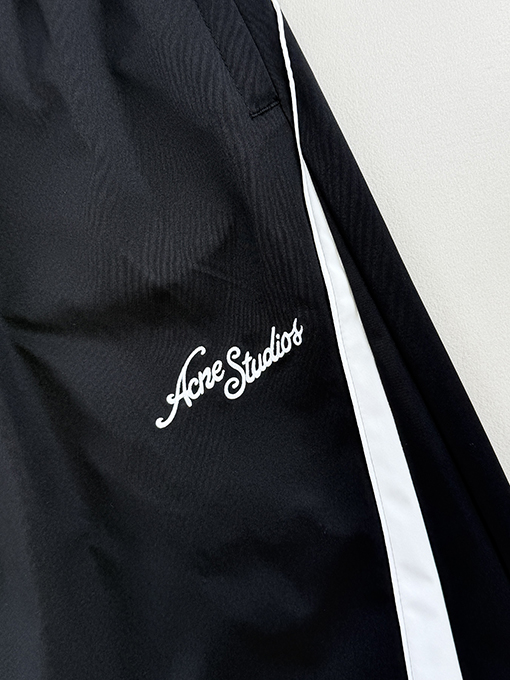 アクネストゥディオズ Acne Studios テック刺繍ロゴ入りトラックパンツ