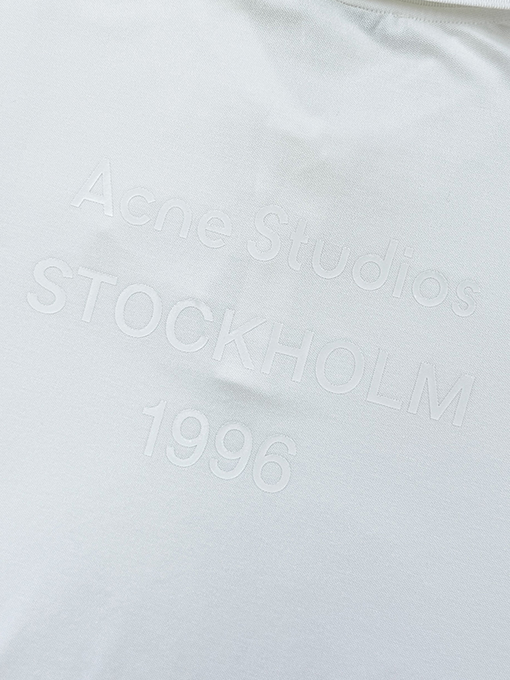 アクネストゥディオズ偽物 Acne Studios オフホワイトの長袖ポロシャツ