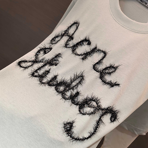 アクネストゥディオズ Acne Studios 袖にフロッキーの文字ツーピース風の長袖シャツ