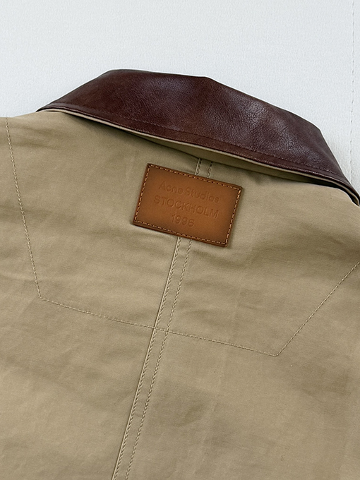 アクネストゥディオズ Acne Studios レザーロゴ入りツイルコットンジャケット