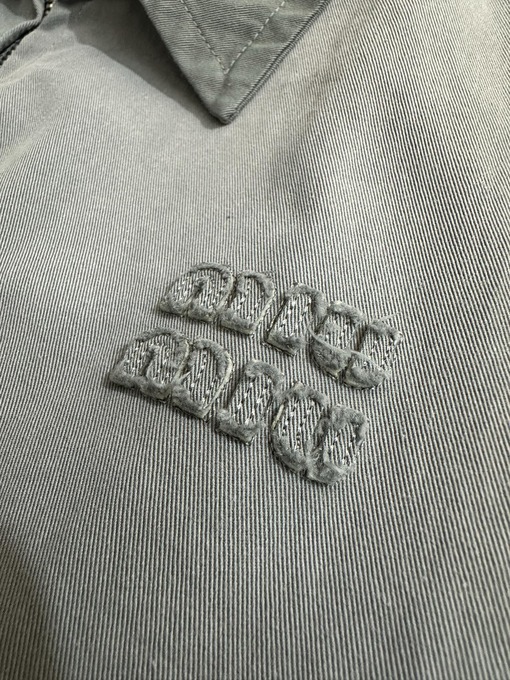 ミュウミュウ 刺繍ロゴ入りヴィンテージジップアップジャケット