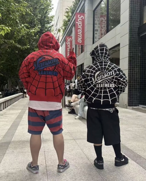 シュプリーム コラボモデル 裏起毛スパイダーウェブ柄ジップアップフーディー