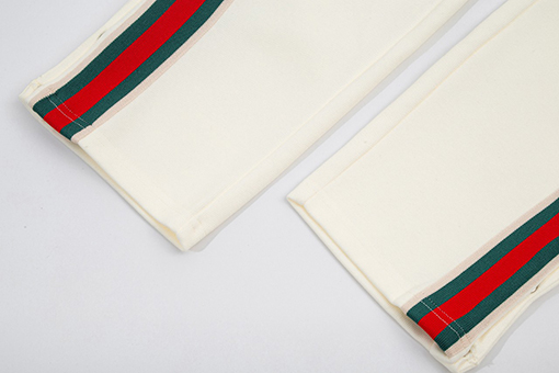 グッチ スウェットパンツ スーパーコピー GUCCI クラシックな赤緑ウェービングパッチ ボタン付きパンツレッグ カジュアルロングパンツ