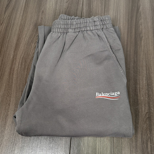 バレンシアガ  スウェットパンツ BALENCIAGA クラシックコーラロゴのウォッシュドスポーツパンツ - グレー、ルーズなストレートフィット