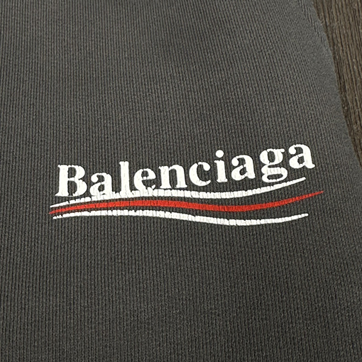 バレンシアガ  スウェットパンツ BALENCIAGA クラシックコーラロゴのウォッシュドスポーツパンツ - グレー、ルーズなストレートフィット