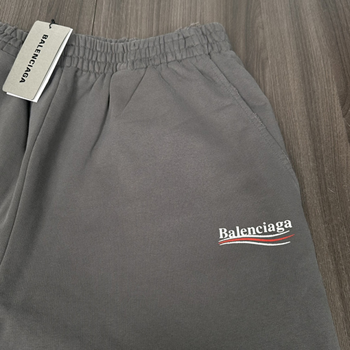 バレンシアガ  スウェットパンツ BALENCIAGA クラシックコーラロゴのウォッシュドスポーツパンツ - グレー、ルーズなストレートフィット
