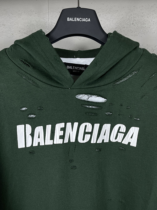 バレンシアガ パーカー BALENCIAGA スーパーコピー アートデザインの裂け目と裏地付きフード付きスウェット