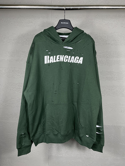 バレンシアガ パーカー BALENCIAGA スーパーコピー アートデザインの裂け目と裏地付きフード付きスウェット