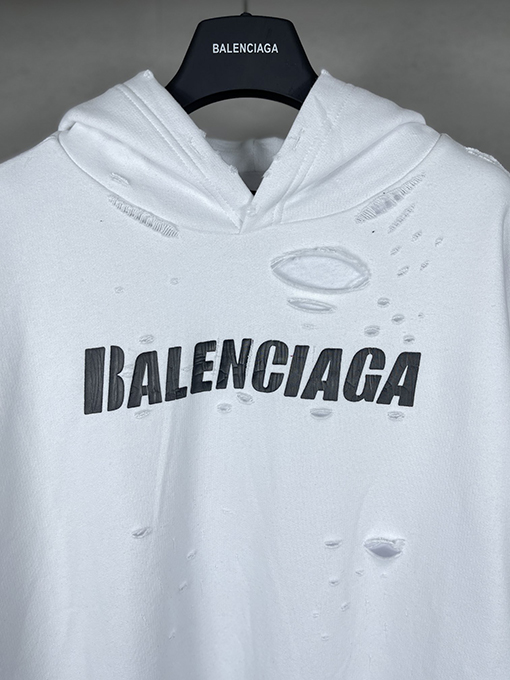 バレンシアガ パーカー BALENCIAGA スーパーコピー アートデザインの裂け目と裏地付きフード付きスウェット