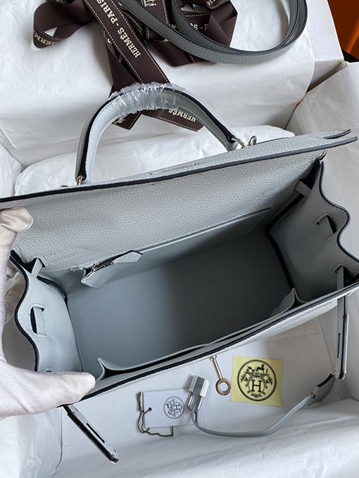 エルメス ケリー 28 コピー 聖杯ブルーシルバーバックルワックスライン 28 cm輸入
