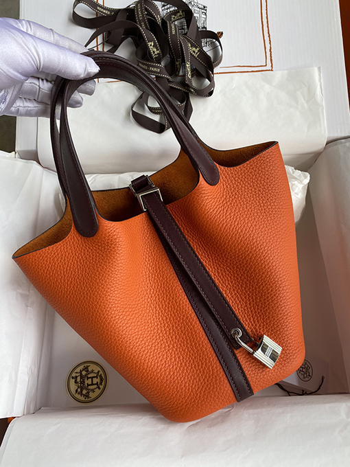 エルメス ゴールド＆シルバーボタンハンドバッグ ライチレザー