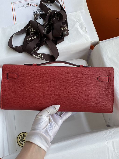 エルメス ケリー カット 31 cm国旗赤と金のバックルケリーカットハンドバッグ