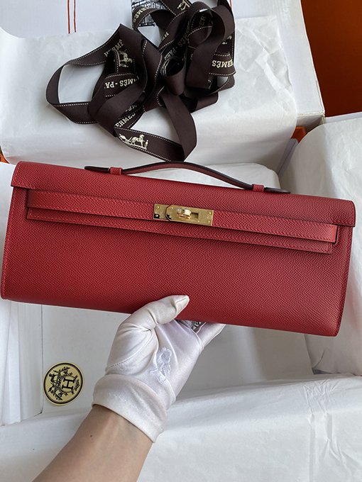 エルメス ケリー カット 31 cm国旗赤と金のバックルケリーカットハンドバッグ