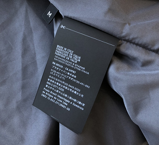 プラダ 三角ロゴのスナップ中綿 コート ジャケット