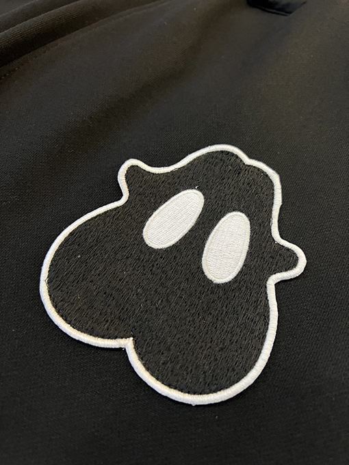 バーバリー モンスター刺繍柄コットンパンツ