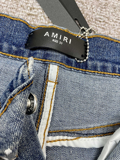 アミリ  ウォッシュ古いカシュープリントジーンズ