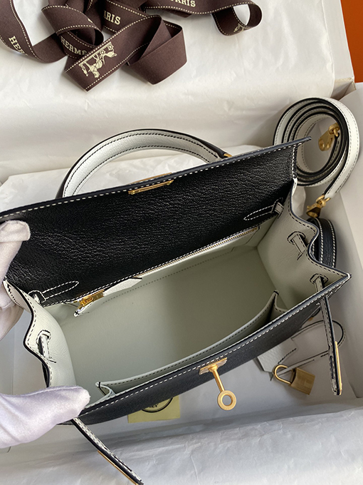 エルメス ケリー25 cmフルハンドステッチ黒と白のハンドバッグ