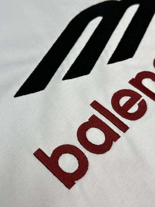 バレンシアガ   両面をつなぎ合わせる半袖Tシャツ