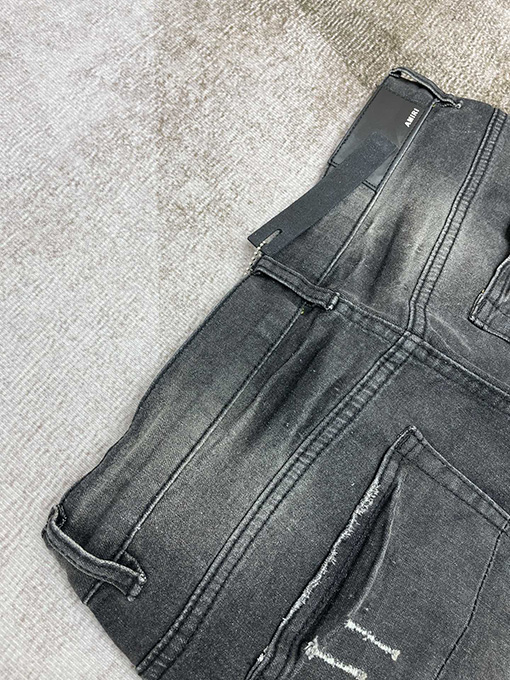 アミリ   オリジナル 猫ヒゲ加工デニムパンツ