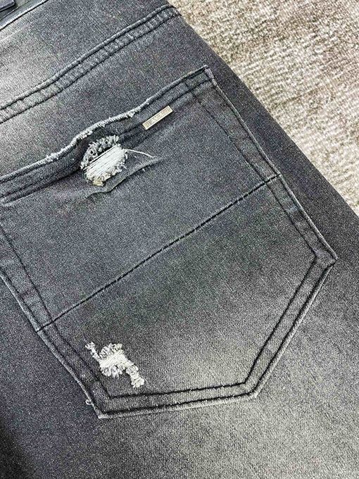 アミリ   オリジナル 猫ヒゲ加工デニムパンツ