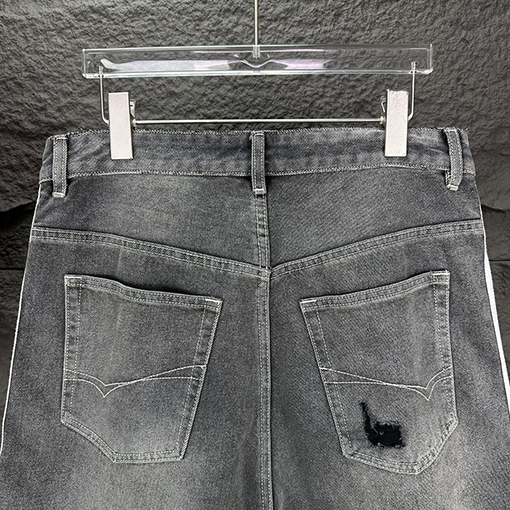 バレンシアガ  新しいリボンの古い穴のデニムパンツ