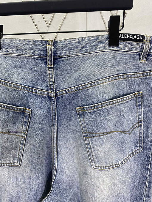 バレンシアガスーパーコピー 不規則なカットのワイドレッグストレートジーンズ