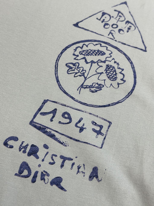 ディオール ピンクのプリント半袖Tシャツ
