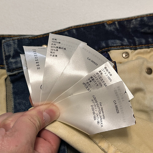 ルイヴィトン水洗いされた明るい線のリベットの長いジーンズ