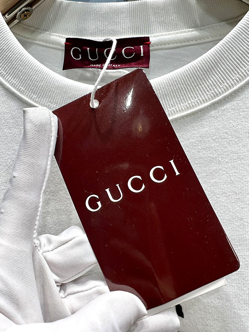 グッチプリントサイン入り半袖Tシャツ