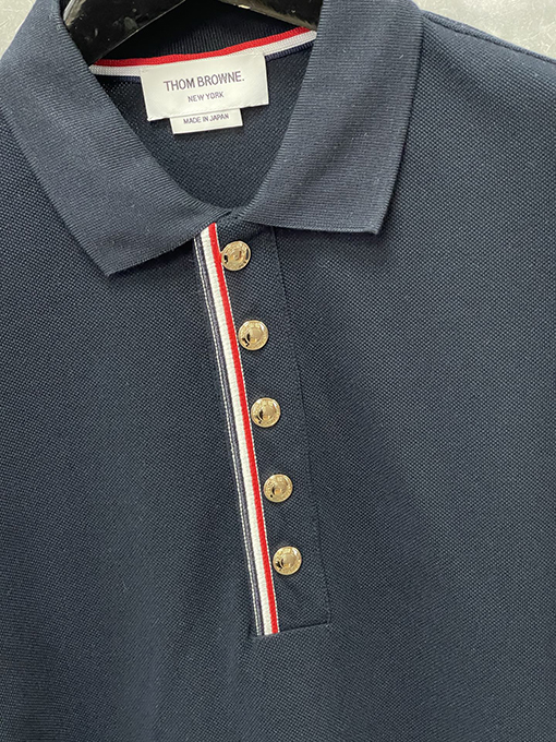 トムブラウンネットカラーのパールコットンポロTシャツ