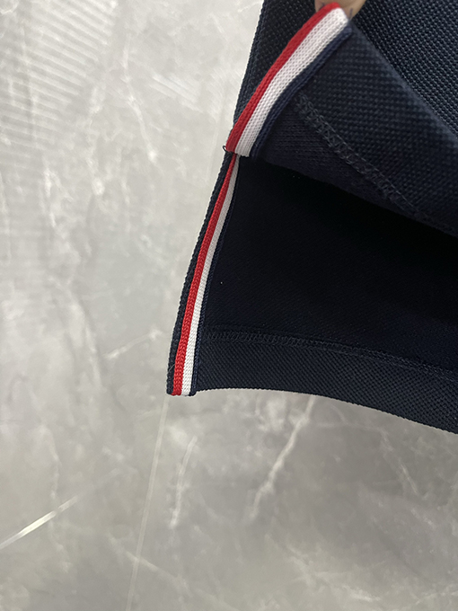 トムブラウンネットカラーのパールコットンポロTシャツ